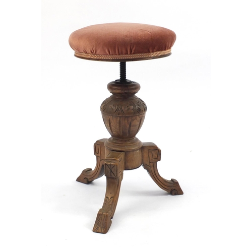 78 - Carved oak adjustable piano stool, 60cm high