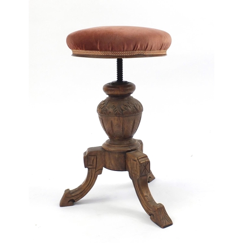 78 - Carved oak adjustable piano stool, 60cm high