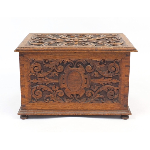 39 - Carved oak blanket box with lift off lid, 38cm H x 58cm W x 40cm D