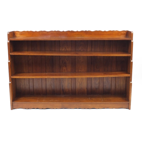 55 - Frank Adams oak waterfall open book case fitted with two adjustable shelves, 91cm H x 142cm W x 26cm... 