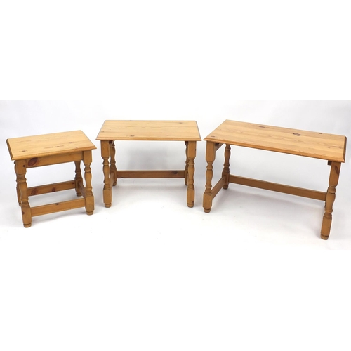 20 - Nest of three pine occasional tables, the largest 48cm H x 73cm W x 42cm D
