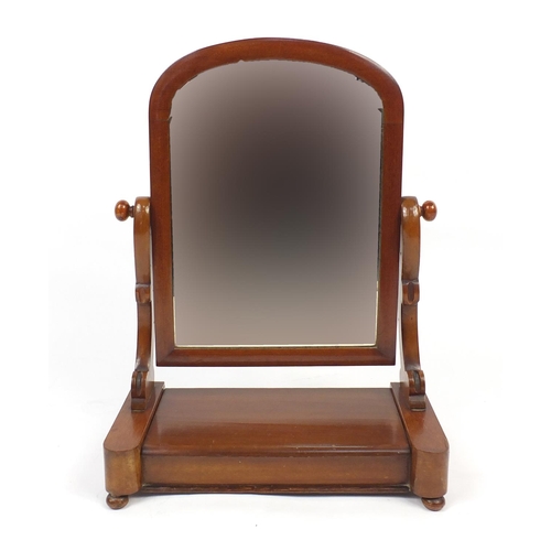 60 - Victorian mahogany swing mirror, 56cm high