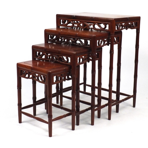 2 - Nest of four Oriental simulated bamboo occasional tables, the largest 69cm H x 50cm W x 35cm D