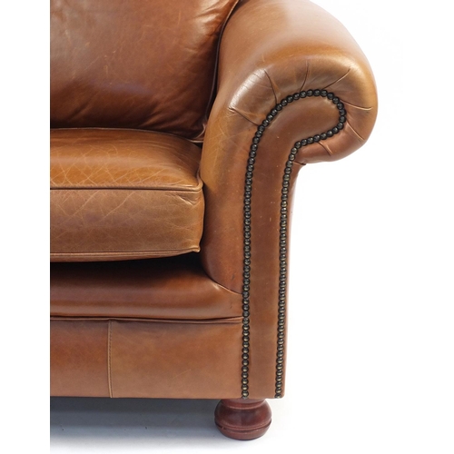 13 - Springvale brown leather two seater setee and arm chair, the setee 170cm in length
