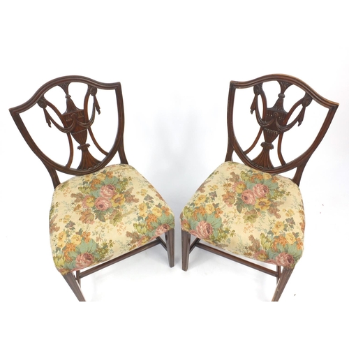 16 - Pair of Georgian shield back occasional chairs with carved urn and swag splats, 97cm high