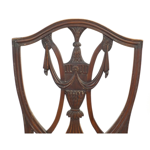 16 - Pair of Georgian shield back occasional chairs with carved urn and swag splats, 97cm high