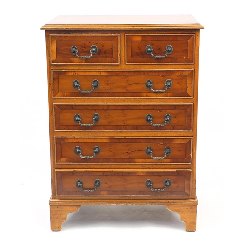 4 - Inlaid yew six drawer chest fitted with two short above four long drawers, raised on bracket feet, 8... 