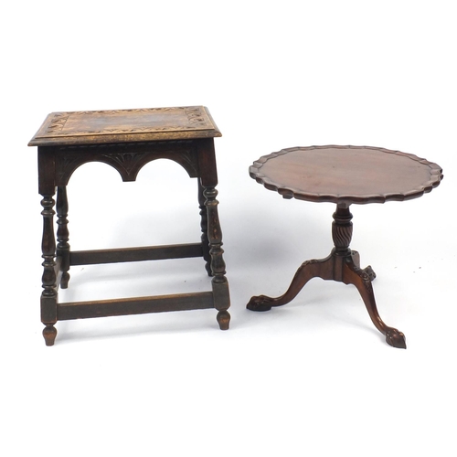 28 - Mahogany occasional table with carved legs and claw and ball feet, and a carved oak occasional table... 