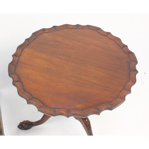 28 - Mahogany occasional table with carved legs and claw and ball feet, and a carved oak occasional table... 