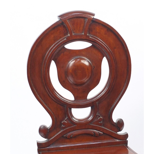 2005 - Pair of Victorian carved mahogany chairs raised on fluted legs, 86m high