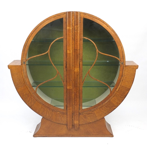 2001 - Circular Art Deco oak display cabinet fitted with four glass shelves, 143cm H x 143cm W x 31cm D