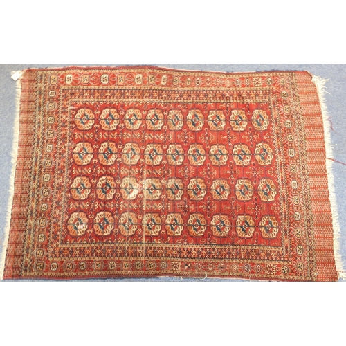 12 - Rectangular Persian rug having an all over geometric design, 200cm x 140cm