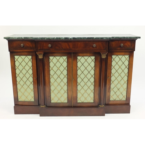 2007 - Mahogany break front side cabinet, with marble top above three frieze drawers, with lattice work pan... 