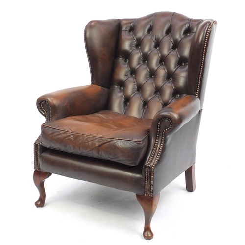 2017 - Queen Anne style leather wingback arm chair with button back upholstery, 98cm high