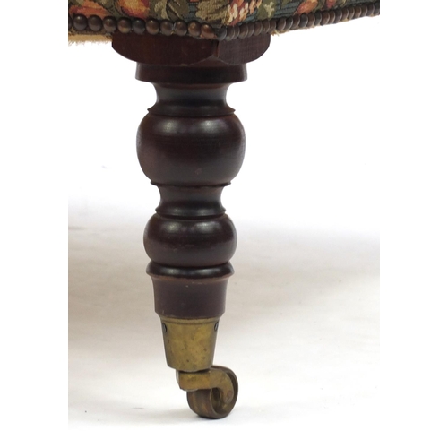 2012 - Large button upholstered foot stool on turned mahogany legs with brass casters, 40cm H x 105cm W x 6... 