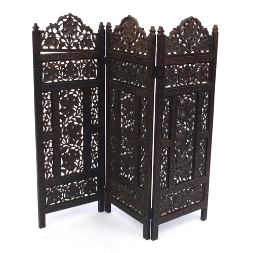 2041 - Oak three fold screen carved with vine leaves and grapes, 95cm high x 110cm wide