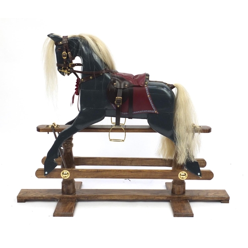 2011 - Child's wooden painted rocking horse, 85cm high