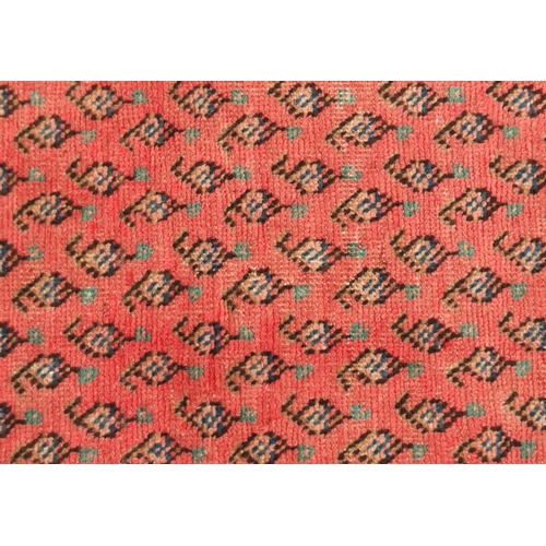 2035 - Persian Araak carpet runner, the central field with stylised motifs within floral boarders, 300cm x ... 