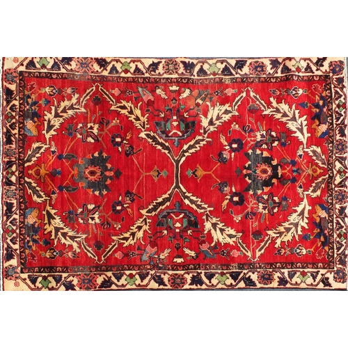 2014 - Rectangular Persian Hamadan rug, the central field and boarders with all over floral motifs onto a r... 