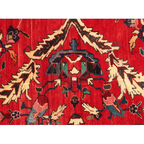 2014 - Rectangular Persian Hamadan rug, the central field and boarders with all over floral motifs onto a r... 