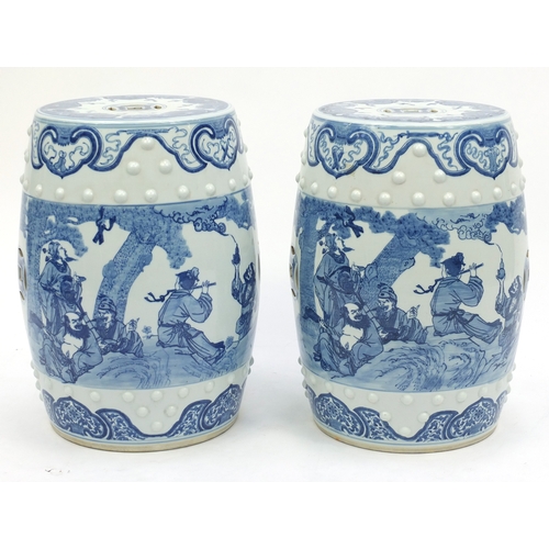 2022 - Pair of Chinese blue and white porcelain garden seats, hand painted with figures, each 49cm high