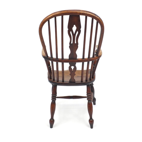 2029 - Elm and Windsor elbow chair, 106cm high