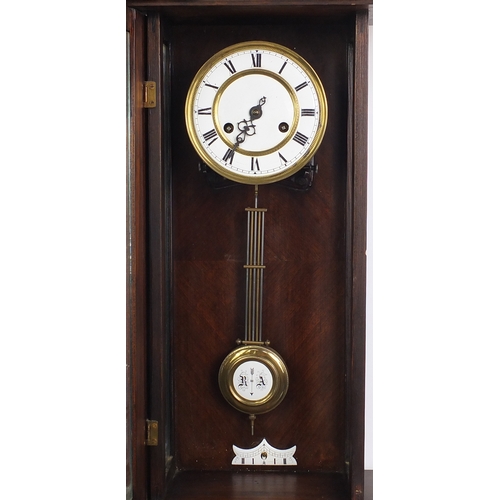 2042 - Black Forest style mahogany regulator wall clock with enamelled dial, 95cm high