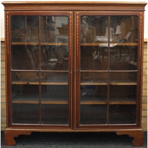 5 - Edwardian inlaid mahogany book case, fitted with three adjustable shelves, raised on bracket feet, 1... 