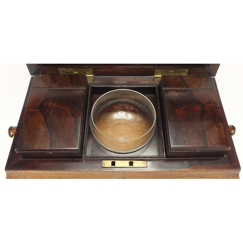 53 - Victorian rosewood tea caddy with brass handles, the hinged lid opening to reveal a fitted interior,... 