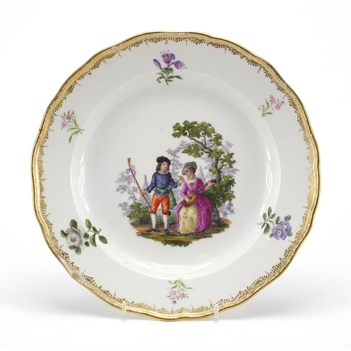 721 - Meissen porcelain plate hand painted with two lovers beside a tree, within a gilt border, blue under... 