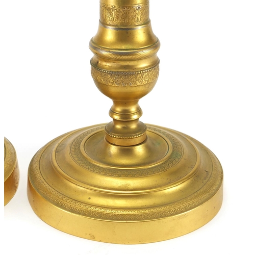 59 - Pair of 19th century French gilt brass candlesticks, 27cm high