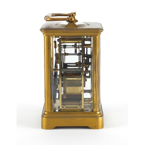 1128 - French brass cased carriage clock by Henri Jacot with enamelled dial and fitted travelling case, the... 