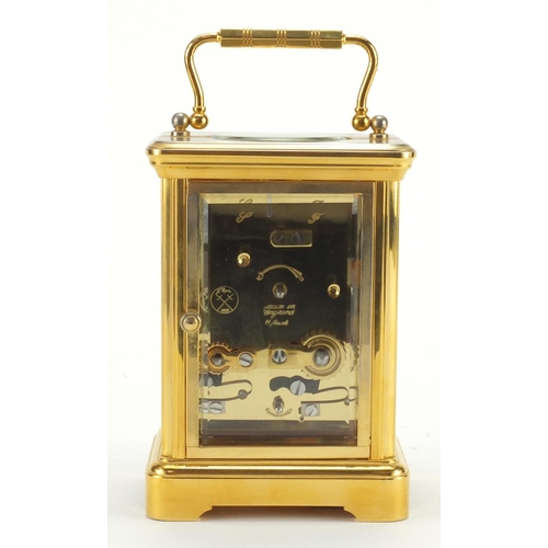 1130 - French brass cased carriage alarm clock by L'Epée with subsidiary dial, guarantee and box, the clock... 