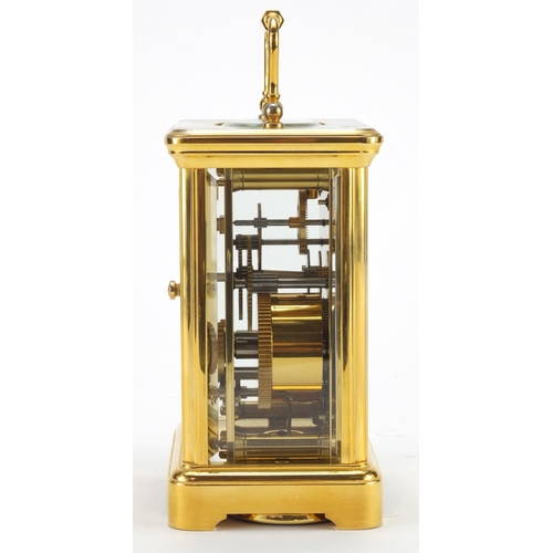 1130 - French brass cased carriage alarm clock by L'Epée with subsidiary dial, guarantee and box, the clock... 