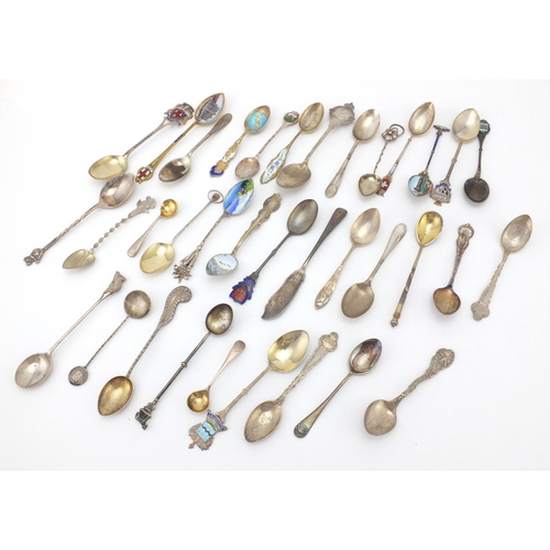 955 - Large collection of silver souvenir teaspoons, some with enamelled terminals, approximate weight 333... 