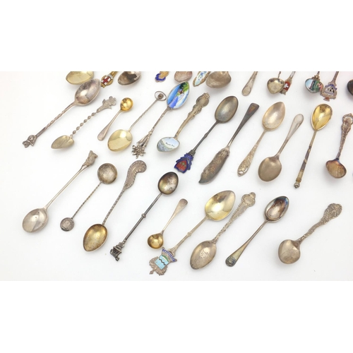 955 - Large collection of silver souvenir teaspoons, some with enamelled terminals, approximate weight 333... 