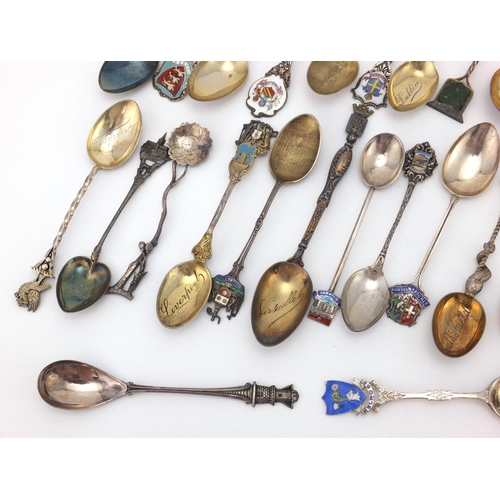 956 - Large selection of silver souvenir silver teaspoons some with enamelled terminals, including Cornwal... 