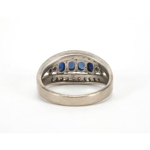 1022 - 18ct white gold sapphire and diamond ring, set with four sapphires and twenty three diamonds, size S... 