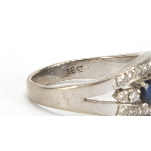 1022 - 18ct white gold sapphire and diamond ring, set with four sapphires and twenty three diamonds, size S... 