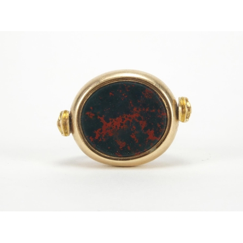 1038 - Victorian unmarked gold and bloodstone spinner seal fob, 3cm high, approximate weight 11.0g