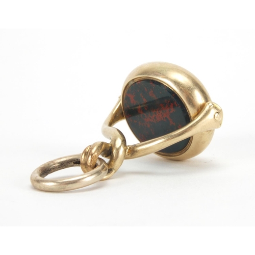 1038 - Victorian unmarked gold and bloodstone spinner seal fob, 3cm high, approximate weight 11.0g