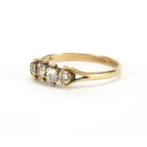 1026 - 9ct gold diamond four stone ring, size Q, approximate weight 1.8g