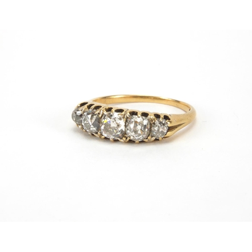 959 - 18ct gold diamond five stone ring, size O, approximate weight 3.8g