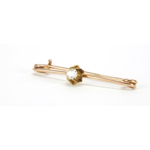 1023 - 9ct gold diamond solitaire bar brooch, 3.8cm in length, approximate weight 1.7g