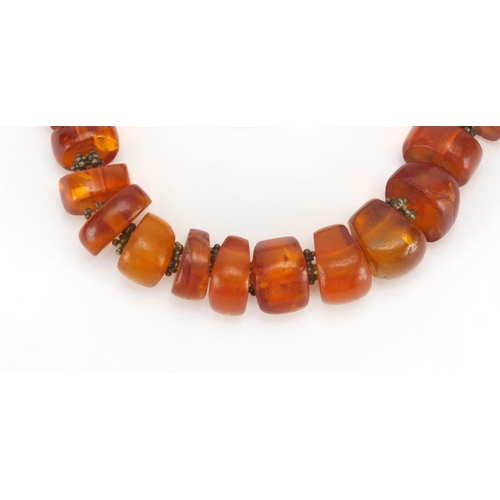 1057 - Amber coloured bead necklace, 38cm in length, approximate weight 102.6g