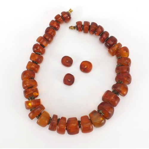 1057 - Amber coloured bead necklace, 38cm in length, approximate weight 102.6g