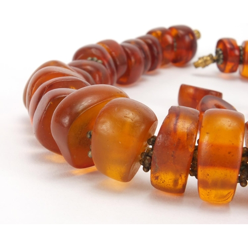 1057 - Amber coloured bead necklace, 38cm in length, approximate weight 102.6g