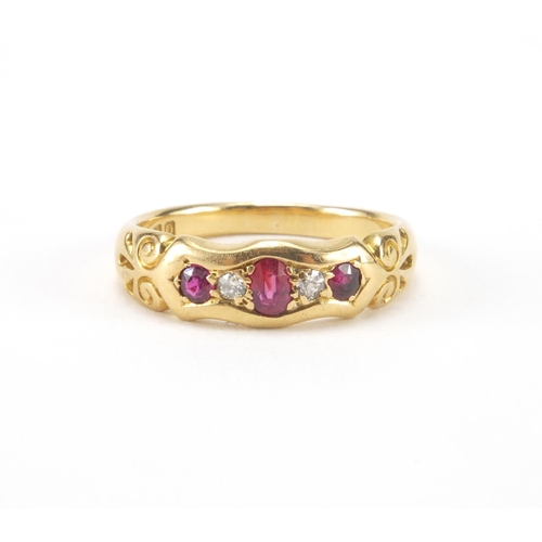 1014 - 18ct gold ruby an diamond ring set with three ruby's and two diamonds, size O, approximate weight 4.... 