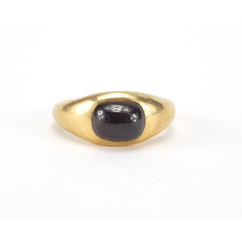 1028 - Unmarked gold cabochon garnet mourning ring, size I, approximate weight 5.3g