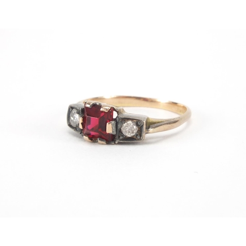 1007 - Unmarked gold red stone and diamond ring, size I, approximate weight 2.5g